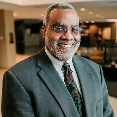Dr. Craig L. Frisby
